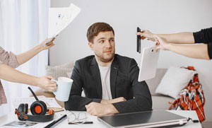 man sitting living room home sad man tired from work